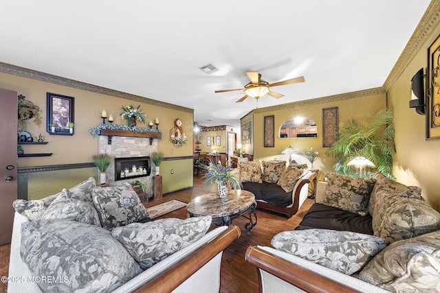 22 Fir Rd Unit 25, Manahawkin, NJ 08050 - living room featuring a ceiling fan, a stone fireplace, wood finished floors, and crown molding