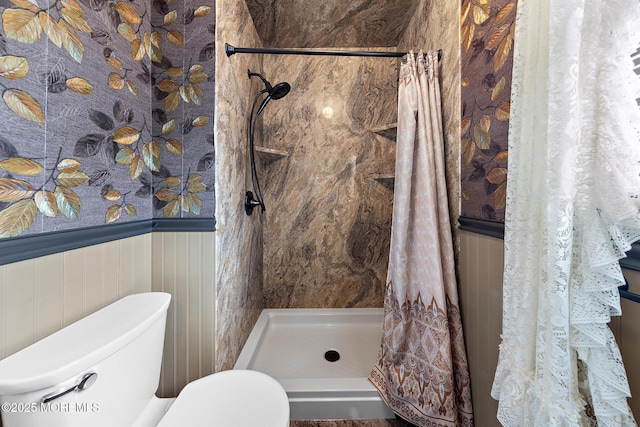 22 Fir Rd Unit 25, Manahawkin, NJ 08050 - bathroom with toilet, a shower stall, and a wainscoted wall