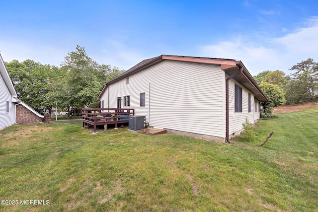 22 Fir Rd Unit 25, Manahawkin, NJ 08050 - view of side of property featuring cooling unit, a lawn, and a wooden deck
