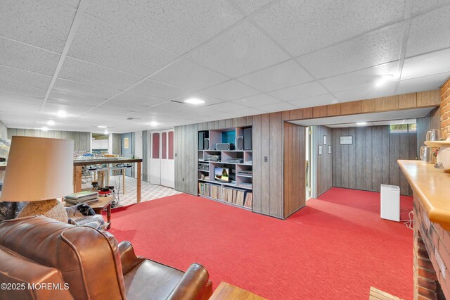 1223 Clover Rd, Brick, NJ 08724 - living area featuring carpet, a drop ceiling, and wood walls