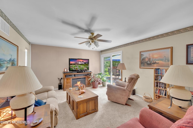 1223 Clover Rd, Brick, NJ 08724 - living room featuring ceiling fan, baseboards, and carpet