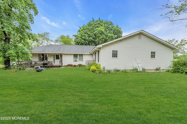 211 Long Swamp Rd, New Egypt, NJ 08533 - rear view of property featuring a yard, roof with shingles, and a porch