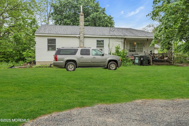 211 Long Swamp Rd, New Egypt, NJ 08533 - single story home featuring a front yard and a shingled roof