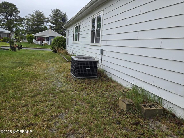 15 Roxton Pl, Toms River, NJ 08757 - view of green lawn featuring central air condition unit