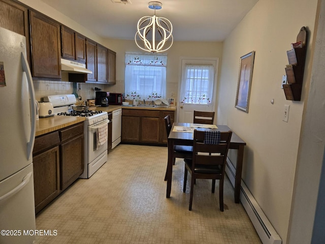15 Roxton Pl, Toms River, NJ 08757 - kitchen featuring white appliances, a chandelier, under cabinet range hood, dark brown cabinetry, and light countertops