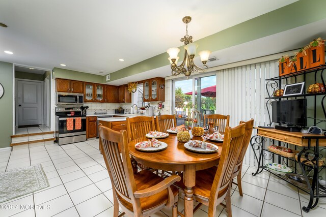 3 Romero Ct, Monroe, NJ 08831 - dining space with light tile patterned flooring, a chandelier, and recessed lighting