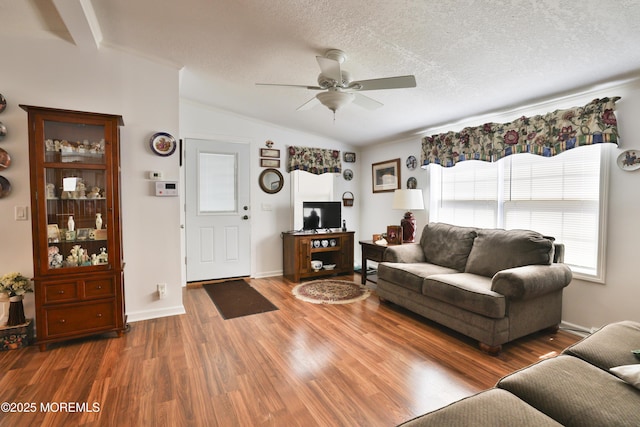 39 Goldenrod Pl, Jackson, NJ 08527 - living area with vaulted ceiling, ceiling fan, wood finished floors, and a textured ceiling