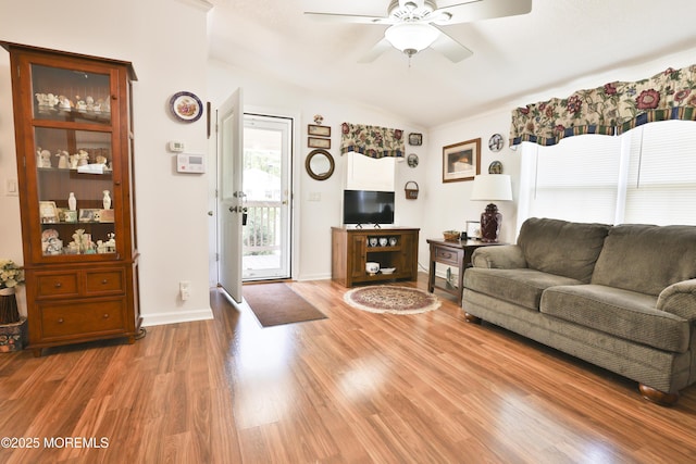 39 Goldenrod Pl, Jackson, NJ 08527 - living area featuring ceiling fan, light wood-type flooring, vaulted ceiling, and baseboards