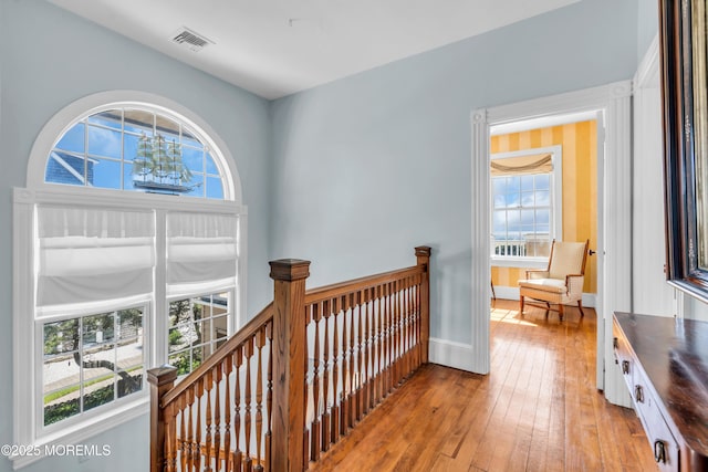 817 S Ocean Ave, Seaside Park, NJ 08752 - hallway with plenty of natural light, an upstairs landing, and light wood-style flooring
