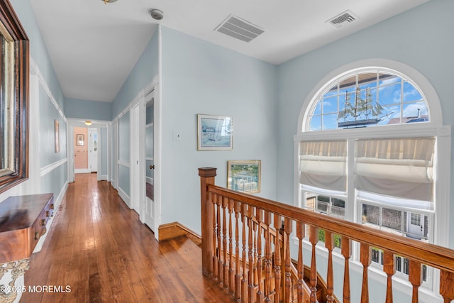 817 S Ocean Ave, Seaside Park, NJ 08752 - corridor with hardwood / wood-style floors, baseboards, and an upstairs landing