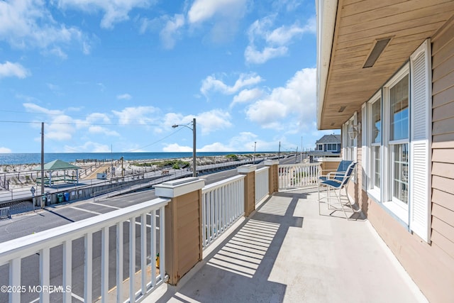 817 S Ocean Ave, Seaside Park, NJ 08752 - view of patio featuring a water view and a balcony