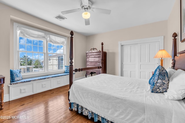 817 S Ocean Ave, Seaside Park, NJ 08752 - bedroom with hardwood / wood-style flooring, a closet, and a ceiling fan