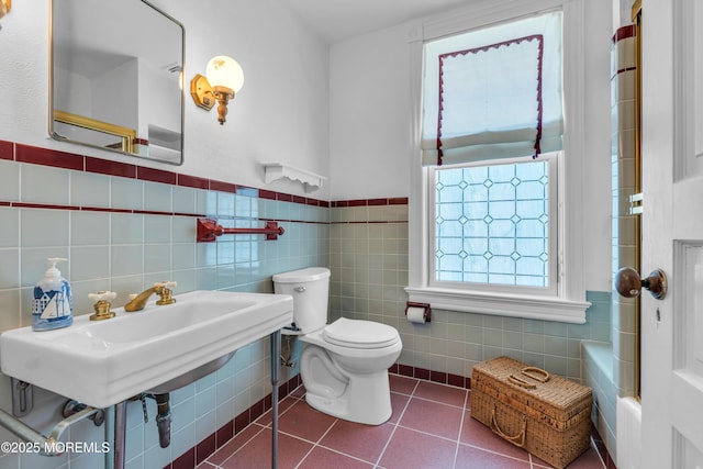 817 S Ocean Ave, Seaside Park, NJ 08752 - full bath with tile walls, toilet, tile patterned flooring, and wainscoting
