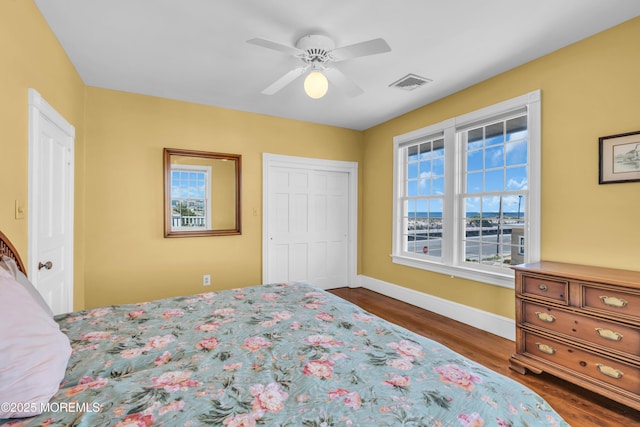 817 S Ocean Ave, Seaside Park, NJ 08752 - bedroom featuring dark wood-style flooring, baseboards, a closet, and ceiling fan