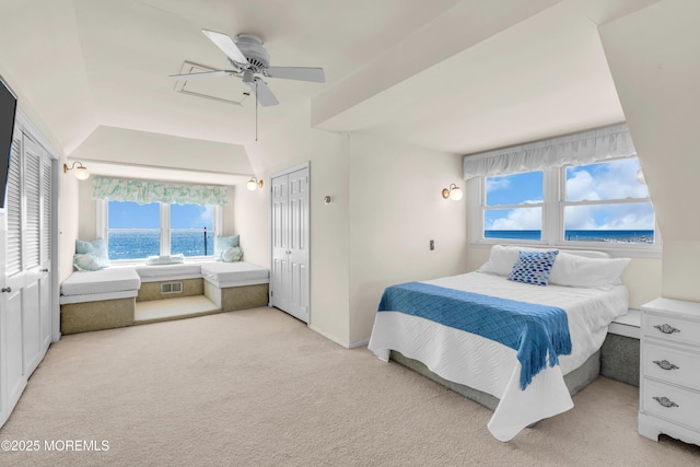 817 S Ocean Ave, Seaside Park, NJ 08752 - bedroom featuring light carpet, a ceiling fan, and a water view