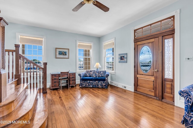 817 S Ocean Ave, Seaside Park, NJ 08752 - foyer entrance featuring ceiling fan, hardwood / wood-style floors, stairway, and baseboards