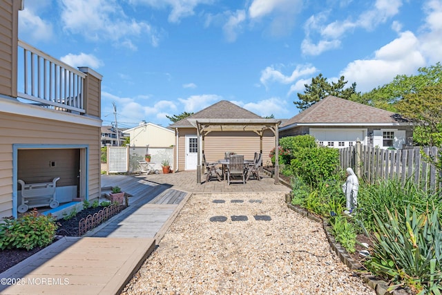 817 S Ocean Ave, Seaside Park, NJ 08752 - fenced backyard with a gazebo, outdoor dining area, and a deck