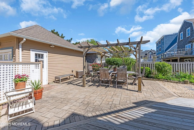 817 S Ocean Ave, Seaside Park, NJ 08752 - fenced backyard with a pergola, outdoor dining area, a patio area, and a residential view