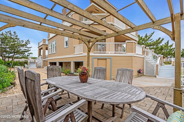 817 S Ocean Ave, Seaside Park, NJ 08752 - view of patio with stairway, outdoor dining space, and a pergola