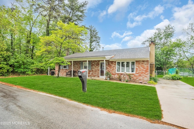 255 Cherokee Trl, Forked River, NJ 08731 - ranch-style house featuring driveway, a chimney, brick siding, and a shingled roof