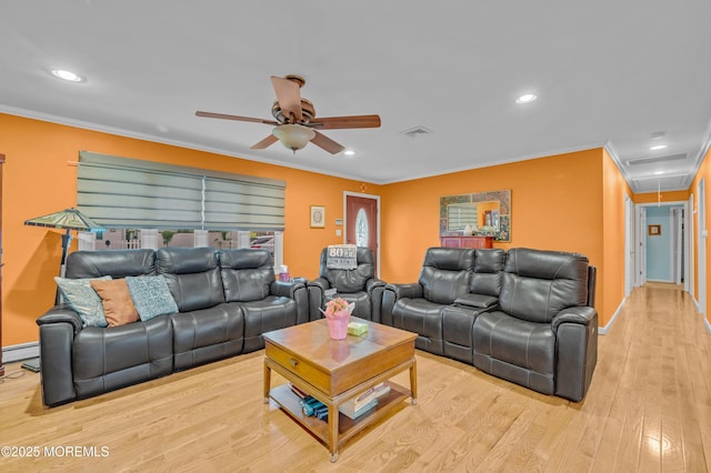 255 Cherokee Trl, Forked River, NJ 08731 - living room with attic access, a ceiling fan, crown molding, a baseboard radiator, and wood finished floors
