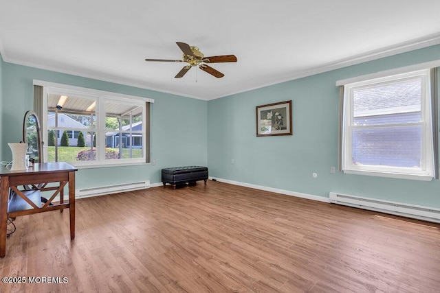 25 Elmswell Ave, Manchester, NJ 08759 - office area with a baseboard heating unit, crown molding, healthy amount of natural light, wood finished floors, and a ceiling fan