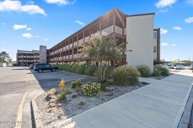 77 E Water St Unit 18, Toms River, NJ 08753 - view of building exterior with uncovered parking