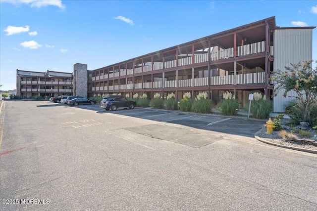 77 E Water St Unit 18, Toms River, NJ 08753 - view of building exterior featuring uncovered parking