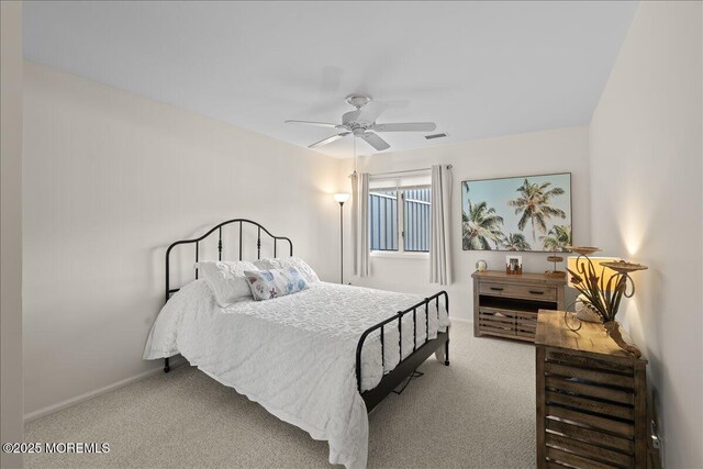 77 E Water St Unit 18, Toms River, NJ 08753 - carpeted bedroom with baseboards and a ceiling fan
