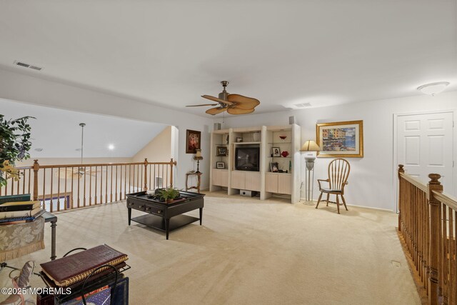 5 Chadwick Ct, Waretown, NJ 08758 - living area with a ceiling fan, light colored carpet, and baseboards
