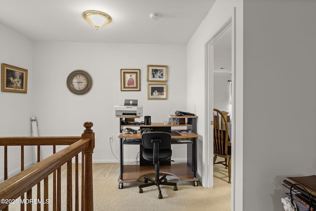 office area featuring light colored carpet
