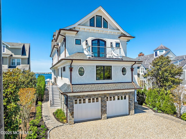 948 Lagoon Ln S, Mantoloking, NJ 08738 - shingle-style home featuring stairway, a garage, driveway, and stone siding