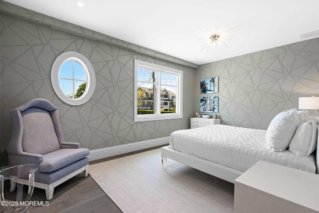 948 Lagoon Ln S, Mantoloking, NJ 08738 - bedroom featuring wallpapered walls, wood finished floors, and baseboards