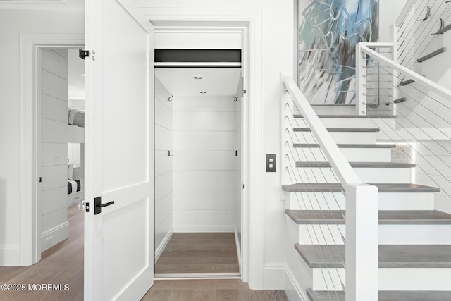 948 Lagoon Ln S, Mantoloking, NJ 08738 - stairs featuring wood finished floors and baseboards