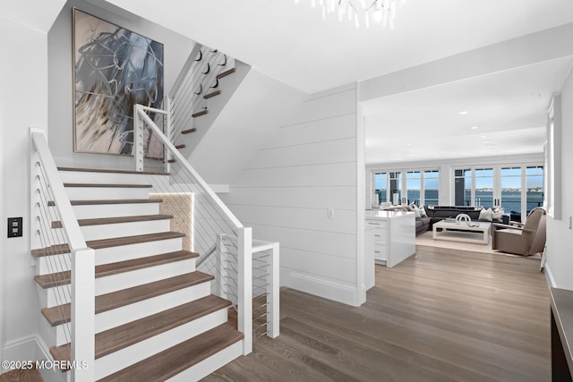 948 Lagoon Ln S, Mantoloking, NJ 08738 - stairs with wood finished floors, baseboards, recessed lighting, a chandelier, and a water view