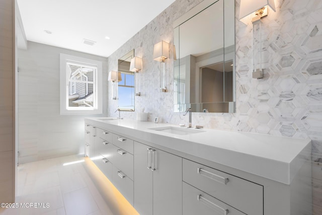 948 Lagoon Ln S, Mantoloking, NJ 08738 - bathroom with double vanity, tile patterned floors, and tile walls