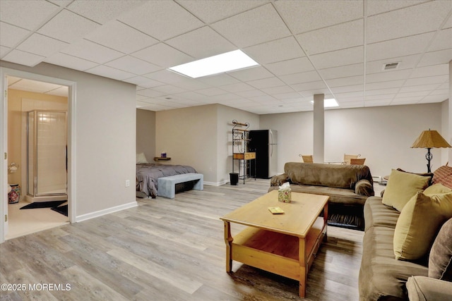 50 Hedgerow Ln, Manalapan, NJ 07726 - living area with wood finished floors, a paneled ceiling, and baseboards