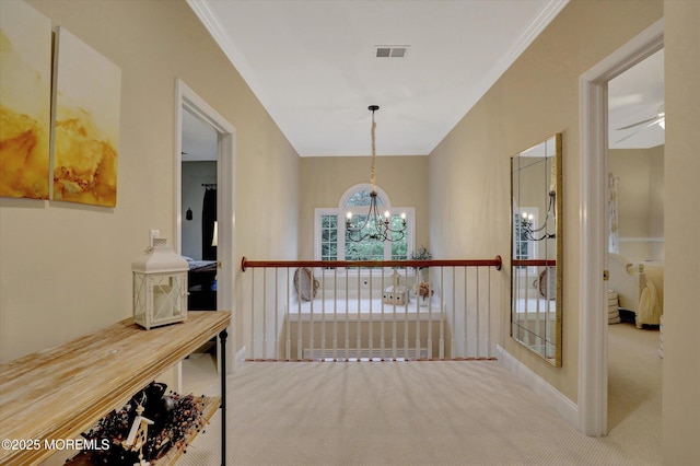 50 Hedgerow Ln, Manalapan, NJ 07726 - hallway with a chandelier, carpet floors, and baseboards