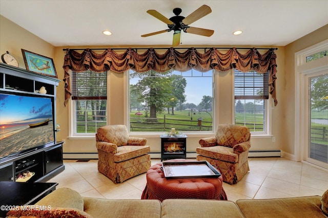 50 Hedgerow Ln, Manalapan, NJ 07726 - living room with a baseboard radiator, light tile patterned flooring, a warm lit fireplace, and recessed lighting