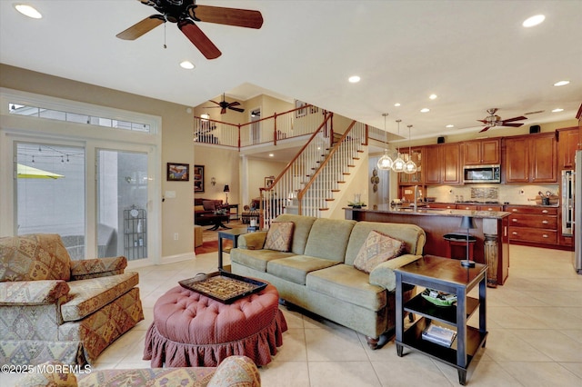 50 Hedgerow Ln, Manalapan, NJ 07726 - living room featuring ceiling fan, recessed lighting, light tile patterned flooring, stairway, and baseboards