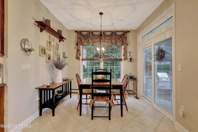 50 Hedgerow Ln, Manalapan, NJ 07726 - dining space featuring a chandelier, light tile patterned floors, baseboards, and a baseboard radiator