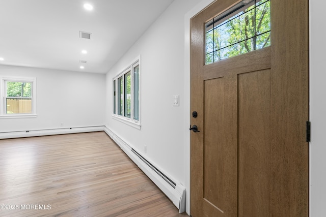 316 Hillside Dr, Neptune Township, NJ 07753 - entrance foyer featuring baseboard heating, recessed lighting, and wood finished floors
