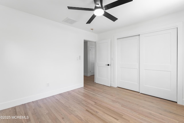 316 Hillside Dr, Neptune Township, NJ 07753 - unfurnished bedroom featuring light wood finished floors, baseboards, a closet, and ceiling fan