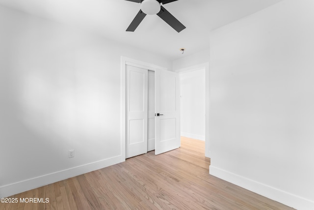 316 Hillside Dr, Neptune Township, NJ 07753 - unfurnished bedroom with baseboards, light wood-style floors, a closet, and ceiling fan