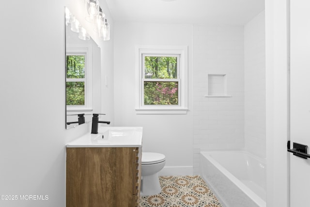 316 Hillside Dr, Neptune Township, NJ 07753 - full bath featuring healthy amount of natural light, tile patterned flooring, vanity, and toilet