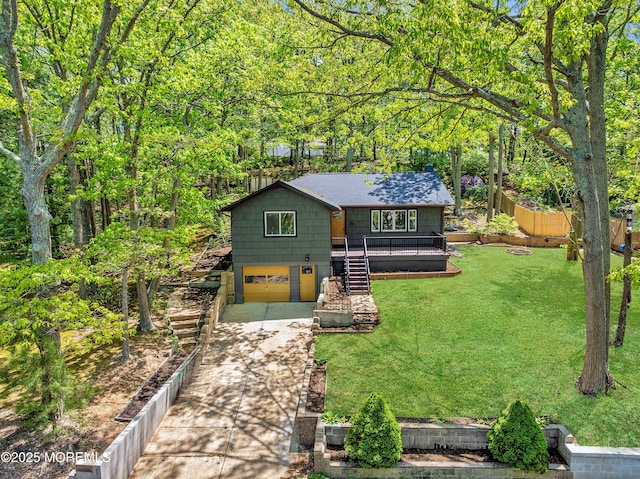316 Hillside Dr, Neptune Township, NJ 07753 - rustic home featuring a garage, stairway, and concrete driveway