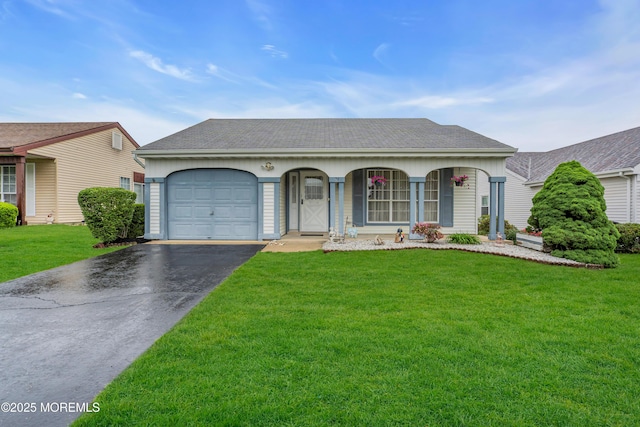 79 Mansfield Ave, Manchester, NJ 08759 - single story home featuring driveway, an attached garage, covered porch, and a front yard