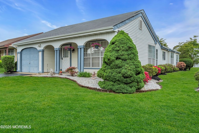 79 Mansfield Ave, Manchester, NJ 08759 - view of front of house with a garage, a front lawn, driveway, and roof with shingles