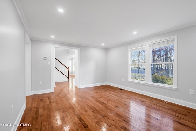 6 Afton Rd, Jackson, NJ 08527 - empty room with crown molding, stairs, light wood-style floors, baseboards, and recessed lighting