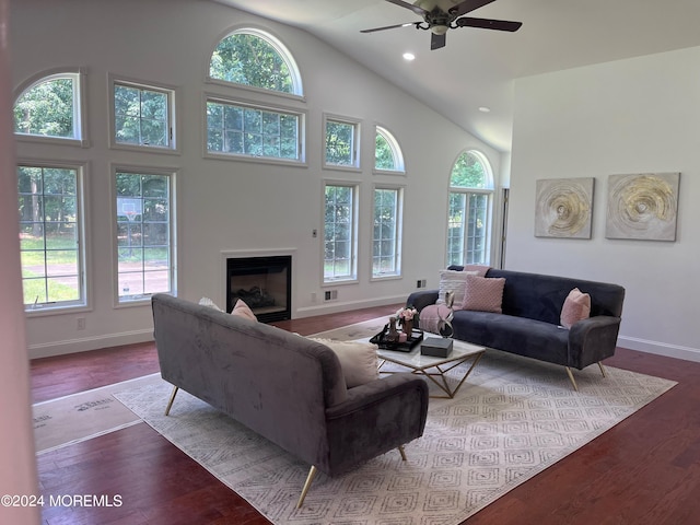 6 Afton Rd, Jackson, NJ 08527 - living area with healthy amount of natural light, a glass covered fireplace, ceiling fan, baseboards, and high vaulted ceiling